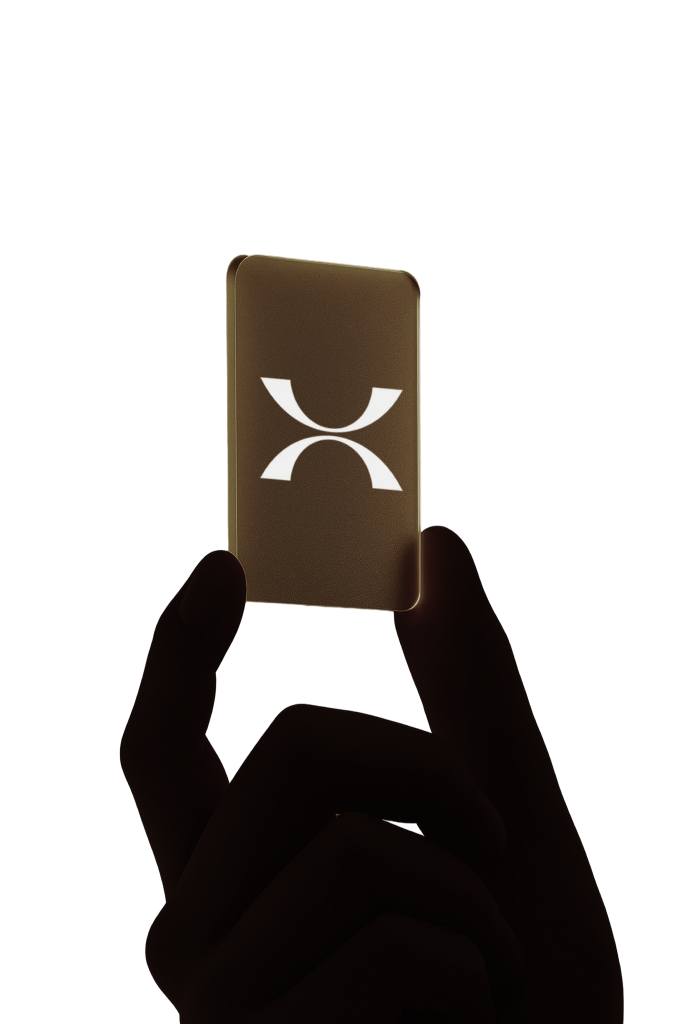 A hand holding a golden card bearing the Hamra symbol